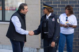 Naser and CopThe-Roux-Ribbon-Cutting_VJ30681